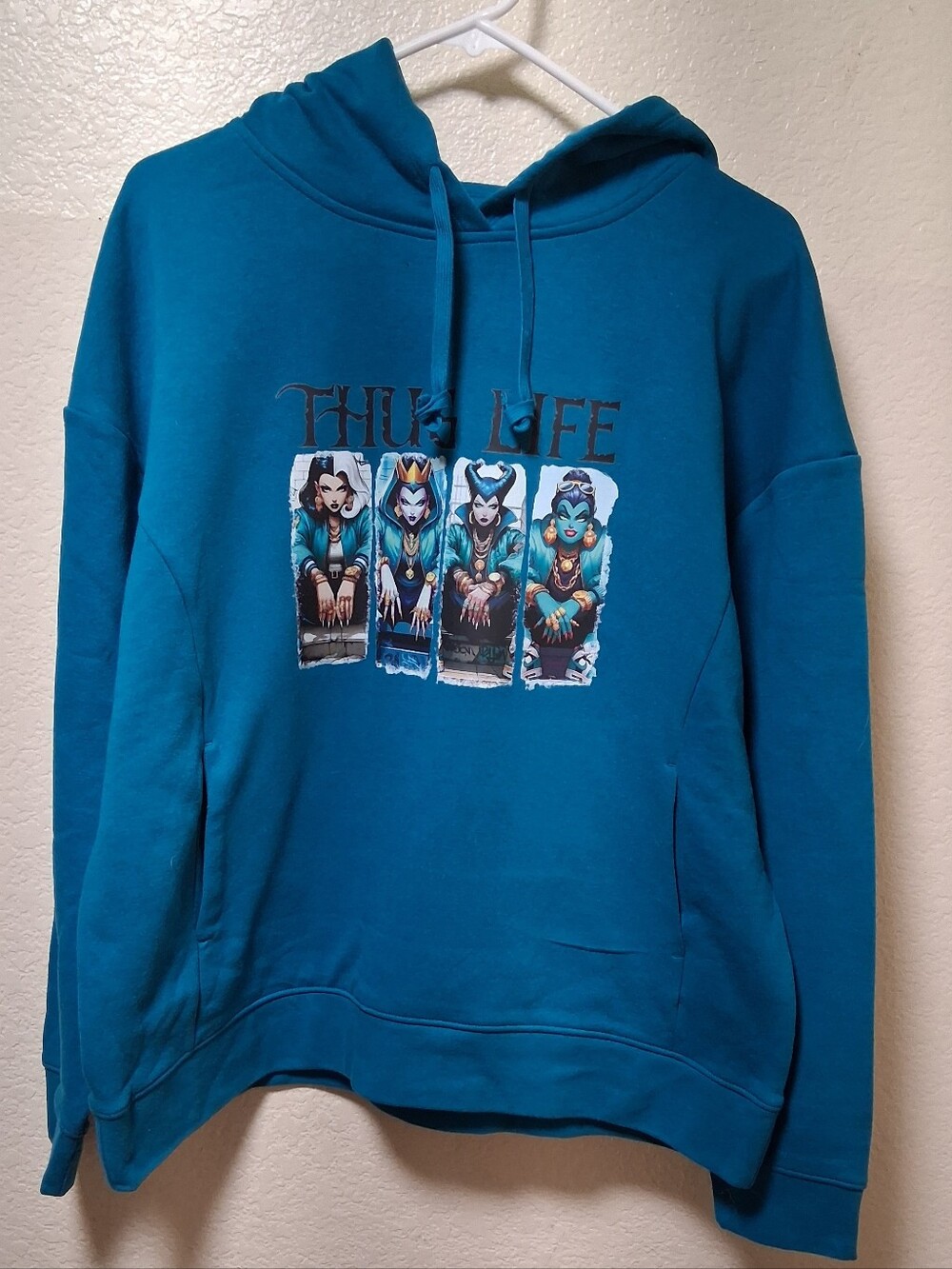 Womens Teal Graphic Pullover Hoodie with Villain Panels